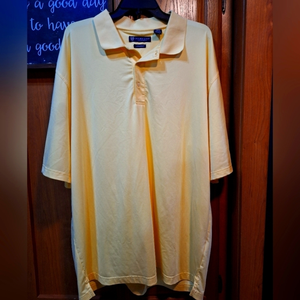 An Oxford Golf Super Dry Coolmax Creamy Yellow Polo Shirt In A Size XXL.